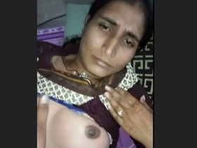Mature Desi aunty's intimate encounter with neighbor featuring Hindi audio