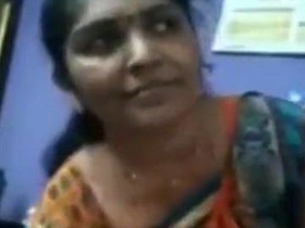 Mature Tamil woman strips down to her lingerie in a video call