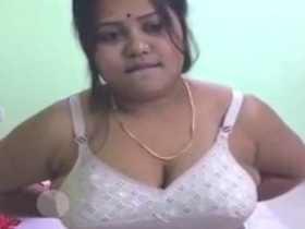 Big-breasted Indian woman flaunts her curves