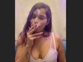 Desi babe smokes and rides dick in club afterparty