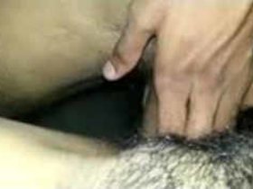A charming Sri Lankan girlfriend with a hairy young vagina is intimated by her boyfriend