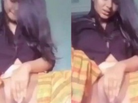 Horny Indian girl pleasures herself with her fingers