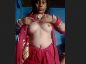 Village woman with attractive breasts