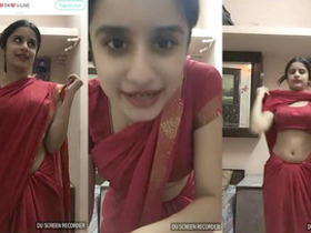 Cute cam girl shows off her slutty side with saree and navel exposure