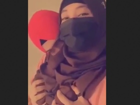 Hijab-clad lesbians in a hot and heavy encounter