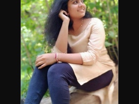 Watch as a Tamil girl, Sruthi, gets naughty in this steamy video