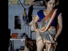 Bhabi in a saree flaunts her body in a village setting