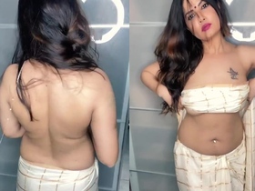 Aabha Paul's hot boobs on display in striptease video