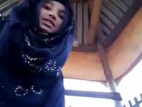 Cute hijabi teen shows off her sexy pussy in a solo video