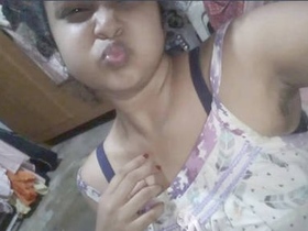 Cute Indian girl shows off her small boobs on webcam