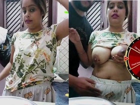 Desi wife flaunts her big boobs and gives a live oral performance