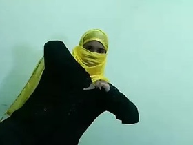 Watch a girl in a hijab doggy style in this hot video