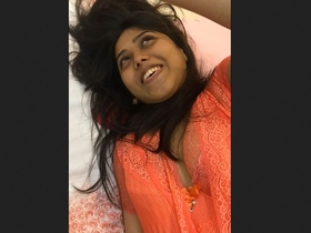 Indian girl moans and talks as she masturbates